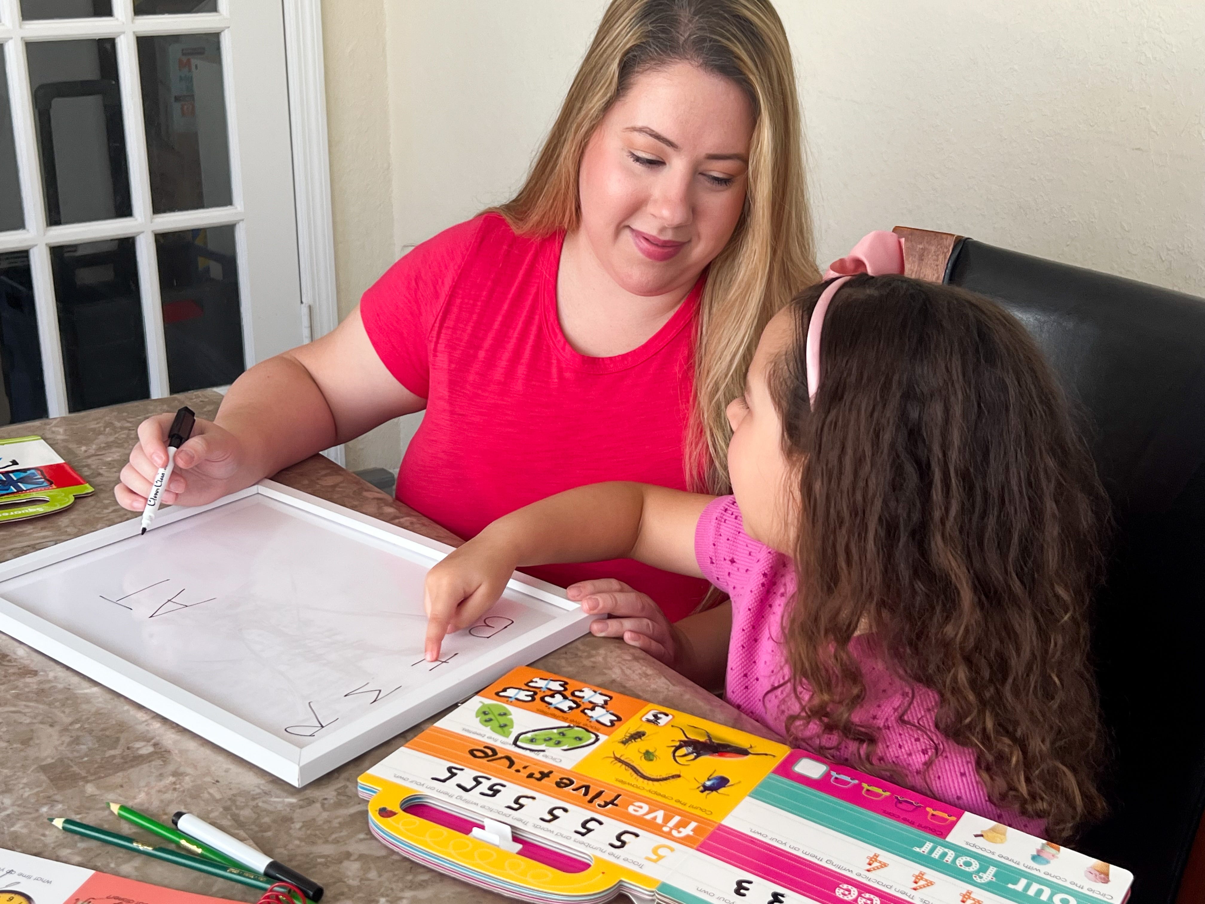 Tiffany Tuttle and her daughter are homeschooling