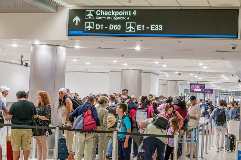 Miami, Florida, Miami International Airport, crowds of people security screening TSA checkpoint, line. (Photo by: Jeffrey Greenberg/Universal Images Group via Getty Images)