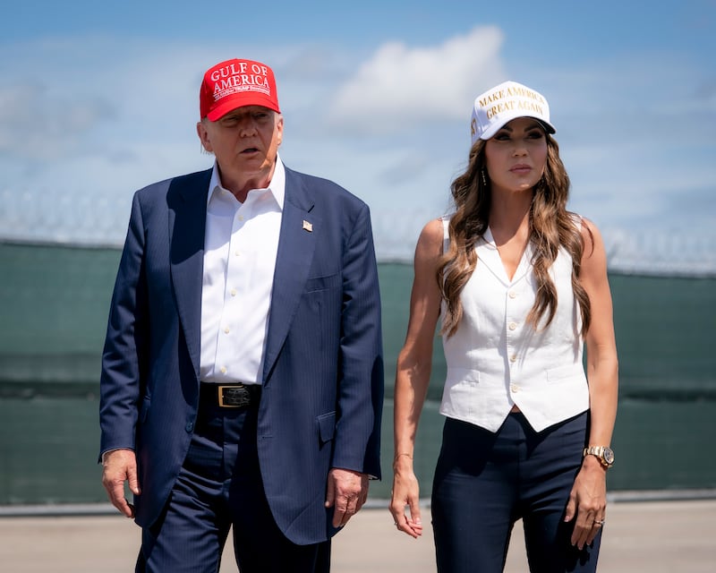 President Donald Trump and Department of Homeland Security Secretary Kristi Noem
