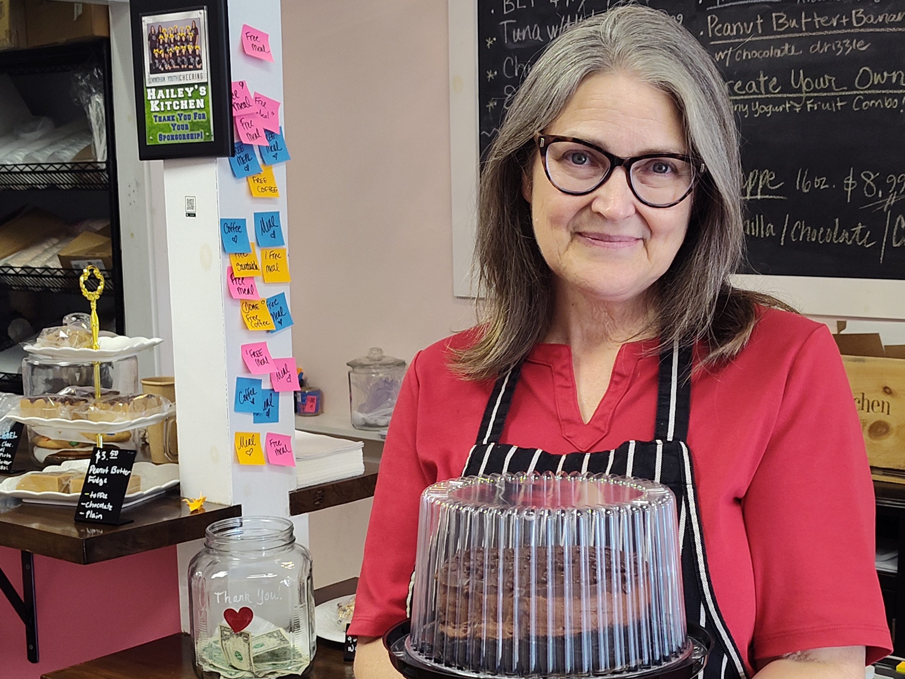 Woman holding cake