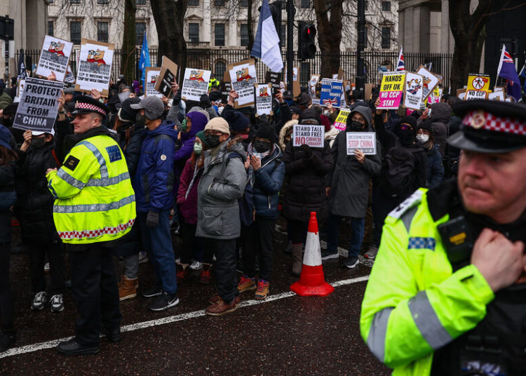 In U.K., China Is a Threat and a Coveted Trade Partner