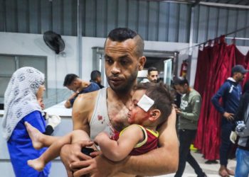 Israel says Gaza ceasefire back on after more than 100 reported killed in strikes