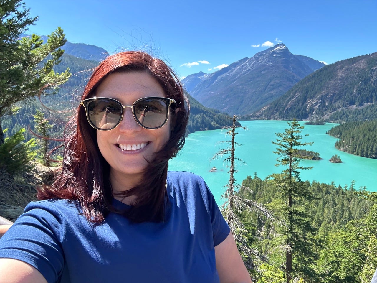 Author Amanda Adler smiling in North Cascades