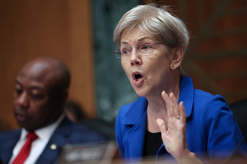 Sen. Elizabeth Warren (R) (D-MA), questions Stephen Miran, currently the Chairman of the Council of Economic Advisors, as he testifies before the Senate Banking, Housing and Urban Affairs Committee September 4, 2025 in Washington, DC. Miran has been nominated by U.S. President Donald Trump to be a member of the Board of Governors of the Federal Reserve System.