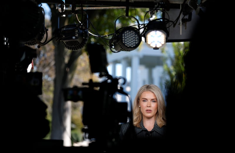 White House Press Secretary Karoline Leavitt participates in a television interview outside of the White House