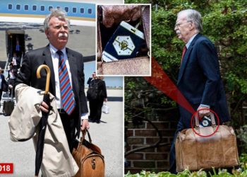 John Bolton spotted still using White House bag tag as he surrenders in classified documents case