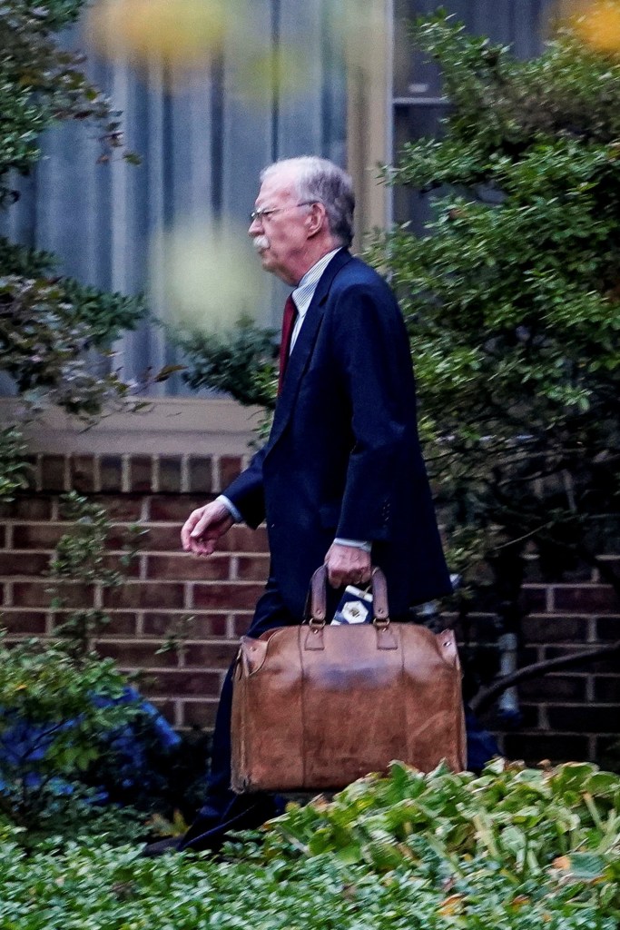 Former National Security Advisor John Bolton leaving his home.