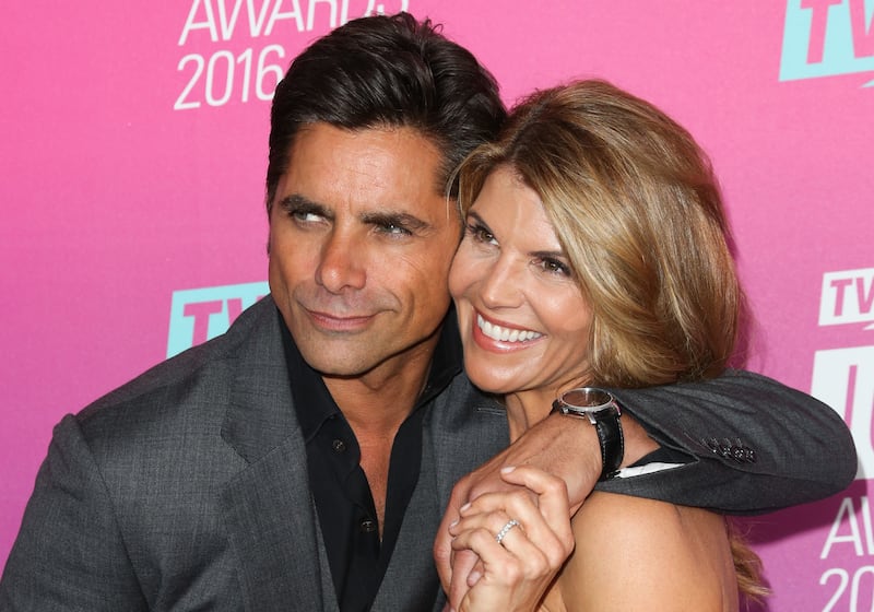 Actors John Stamos (L) and Lori Loughlin