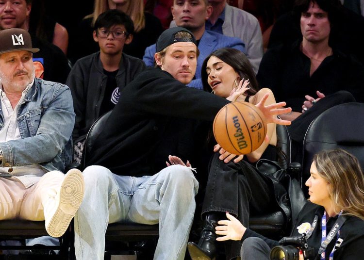 Justin Herbert goes viral for saving Madison Beer from flying basketball at Lakers game amid romance rumors
