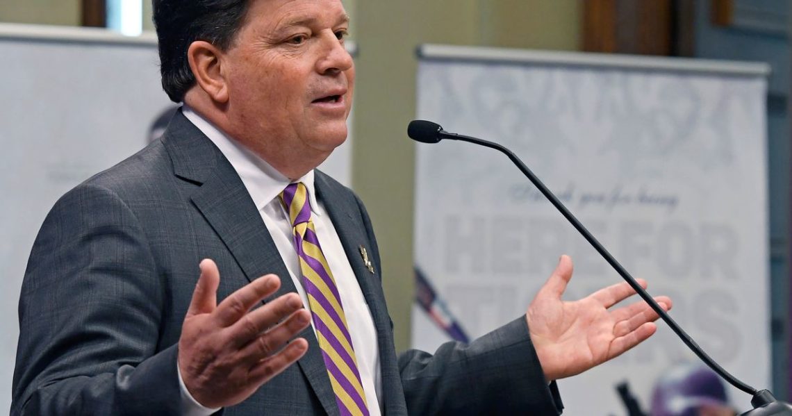 LSU athletic director Scott Woodward resigns, 4 days after the firing of football coach Brian Kelly