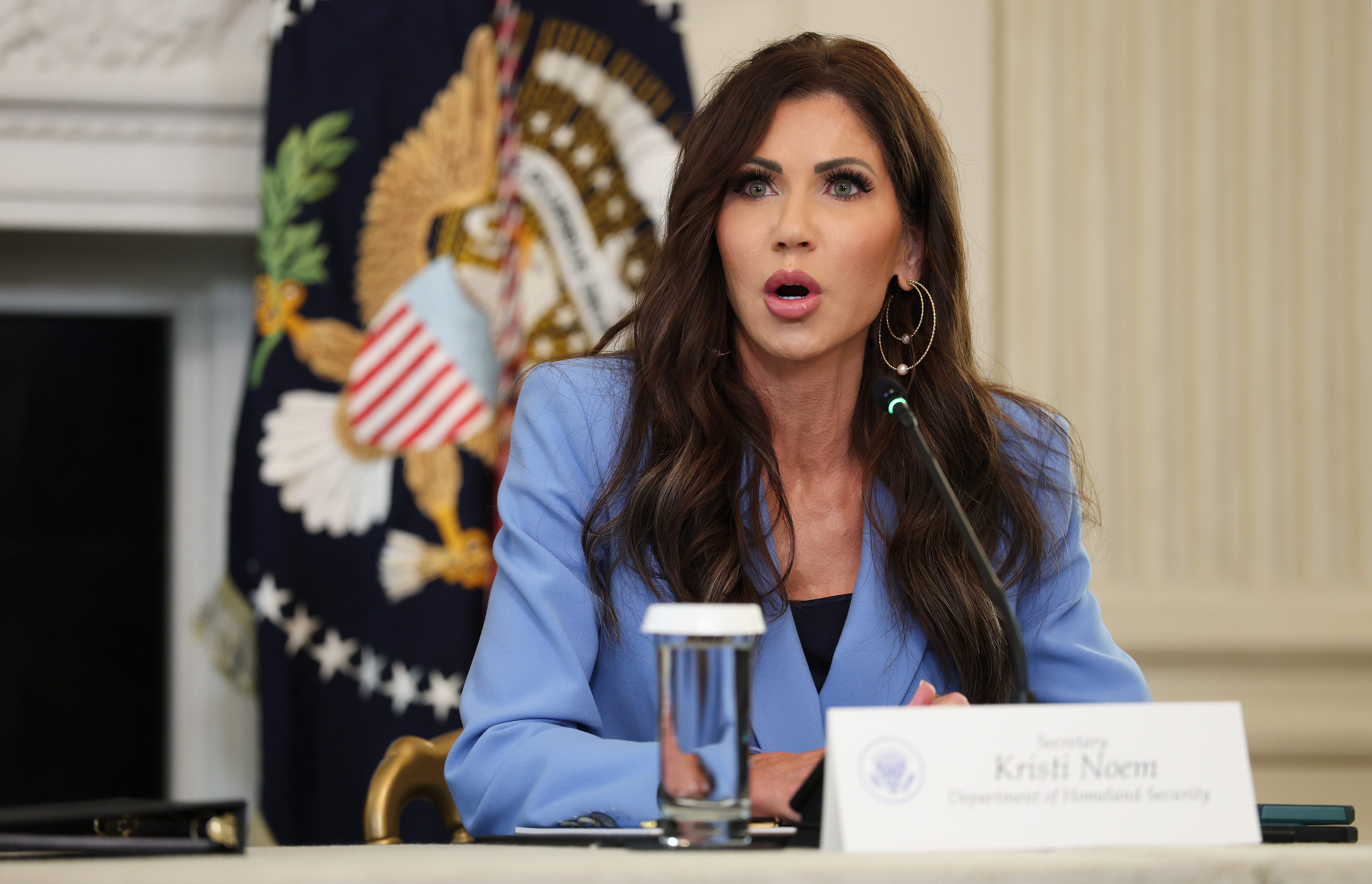 U.S. Secretary of Homeland Security Kristi Noem speaks during a roundtable discussion in the State Dining Room of the White House on October 08, 2025 in Washington, DC