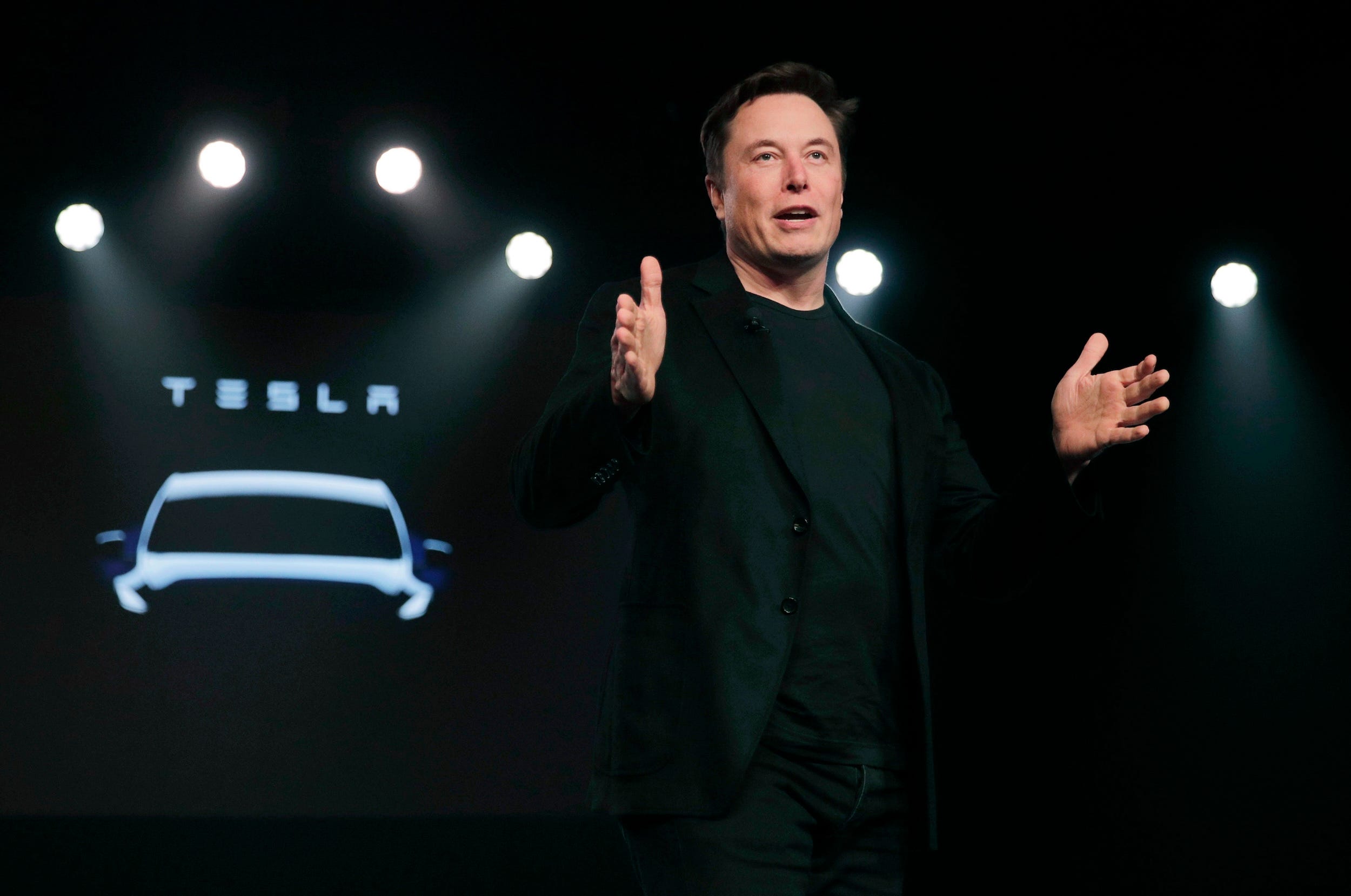 Elon Musk speaks during the unveiling of the Tesla Model Y