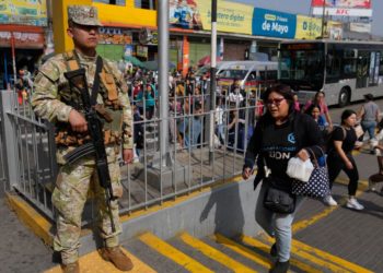 Military and police patrol streets of Peru’s capital as state of emergency begins