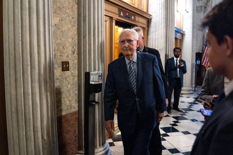 Sen. Mitch McConnell walking to cast a vote in the Senate at the end of September.