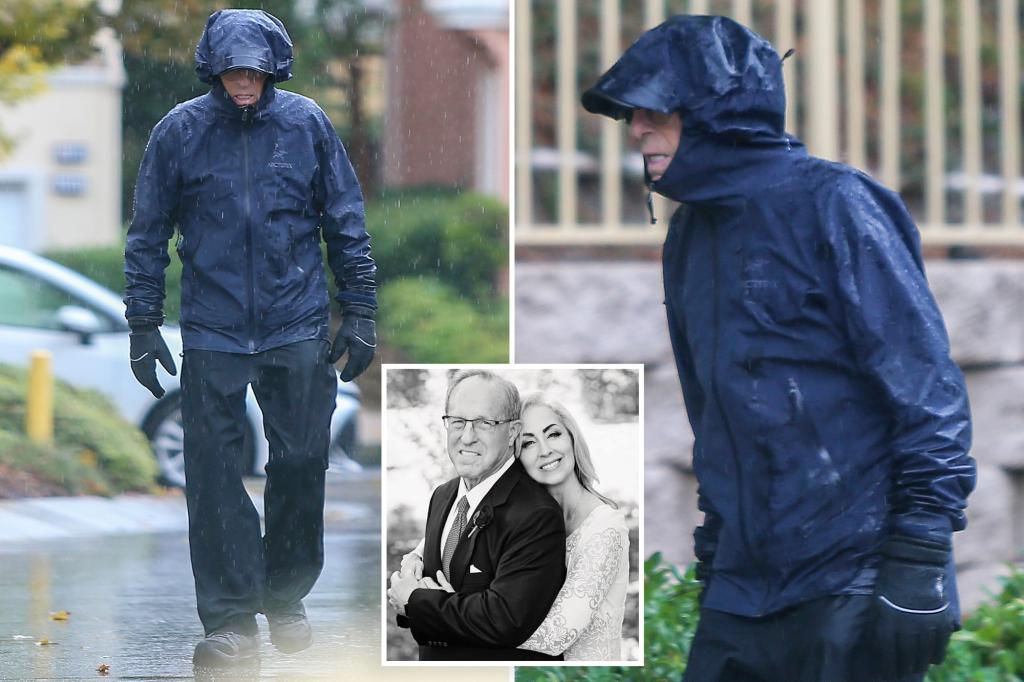 Mitt Romney’s despondent brother strolls through rain days after estranged wife found dead