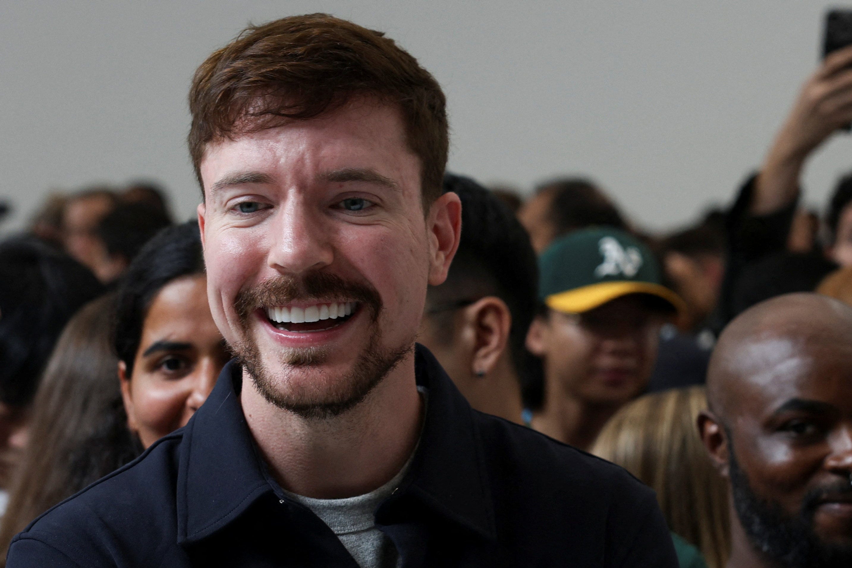 MrBeast, whose name is Jimmy Donaldson, and Apple CEO Tim Cook.