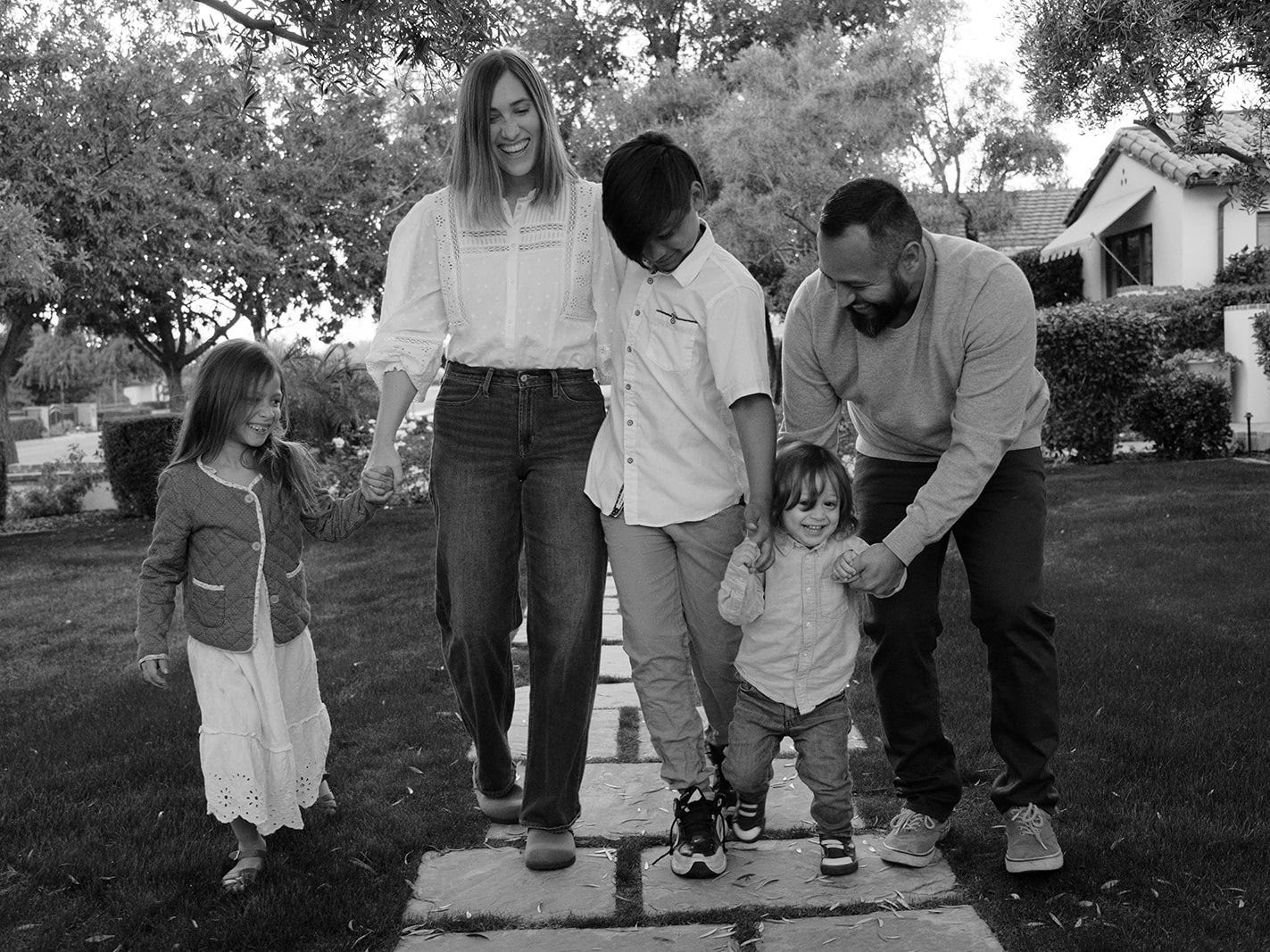 Black and white photo of the author with her family.