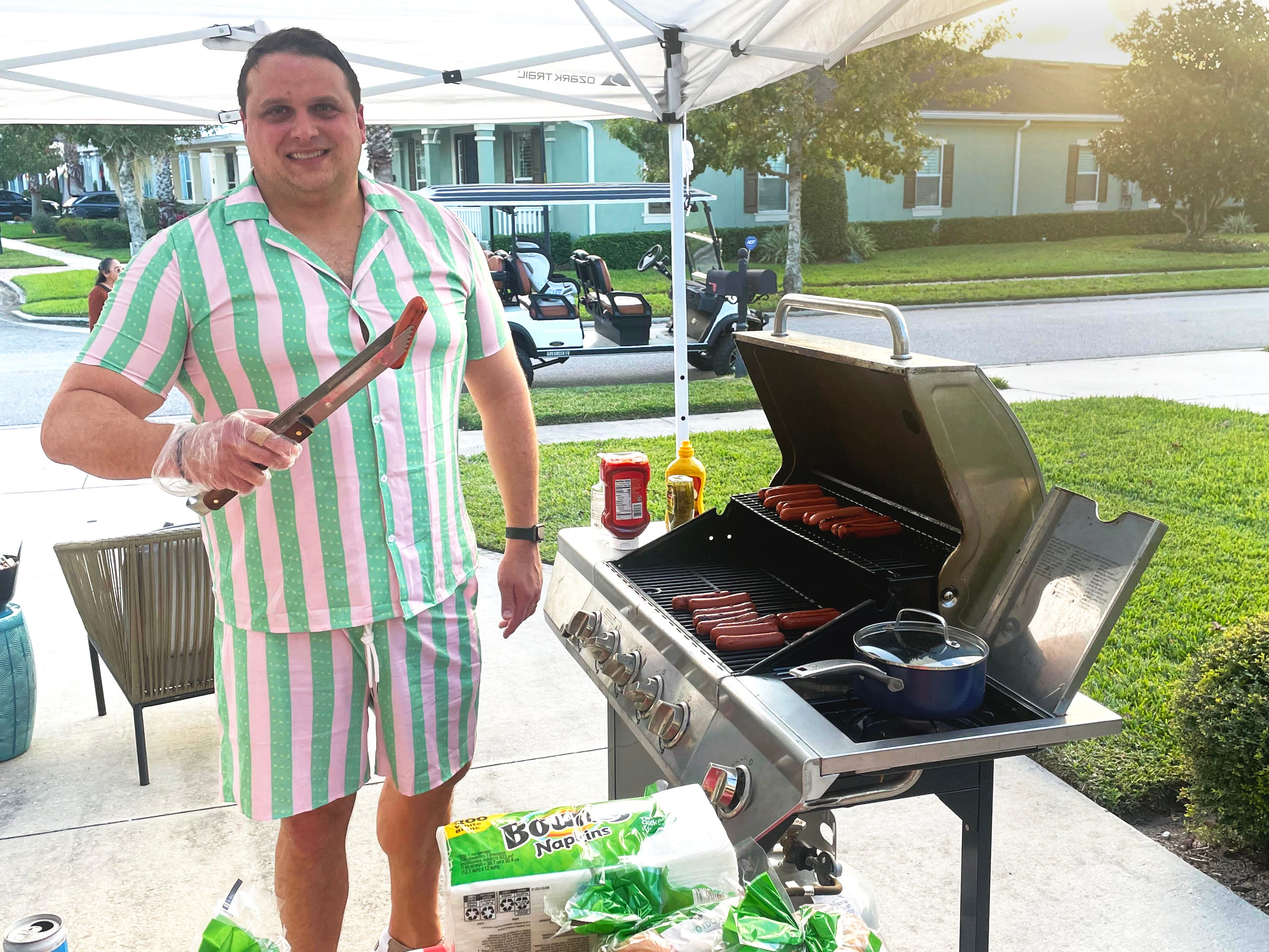 The author's husband shows off his grilling skills.