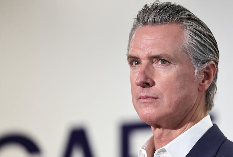 Newsom looks on before he speaks at Belvedere Middle School before signing legislation aimed at improving kids' nutrition and health across California on October 8, 2025 in Los Angeles, California. The bill bans ultra-processed foods (UPFs) from school meals in the state. (Photo by Mario Tama/Getty Images)