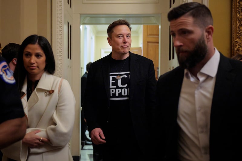 Elon Musk pictured with Katie Miller