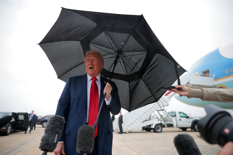 resident Donald Trump speaks to the press before boarding Air Force One for a trip to the Middle East on October 12, 2025 at Joint Base Andrews, Maryland.