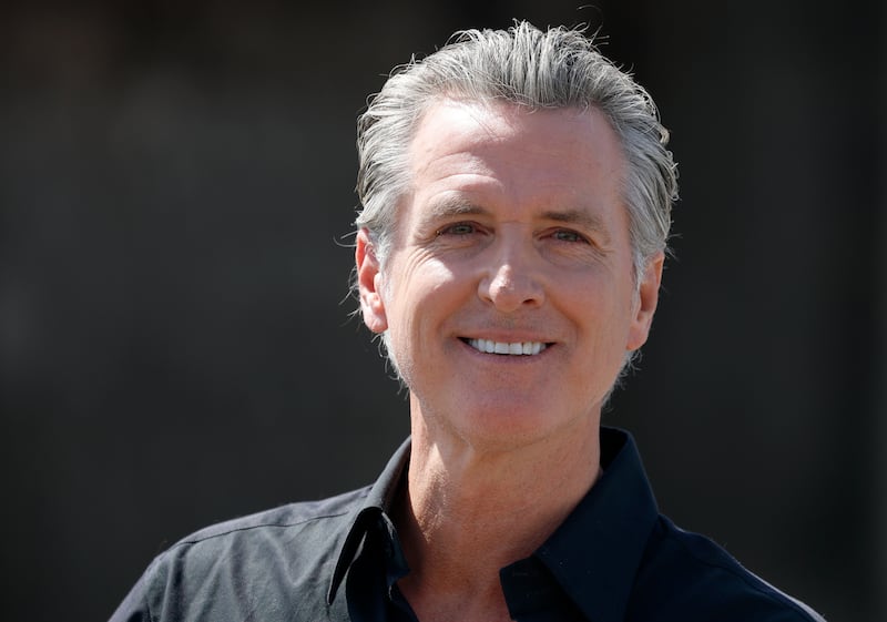 California Governor Gavin Newsom speaks during a news conference at Gemperle Orchard on April 16, 2025 in Ceres, California.