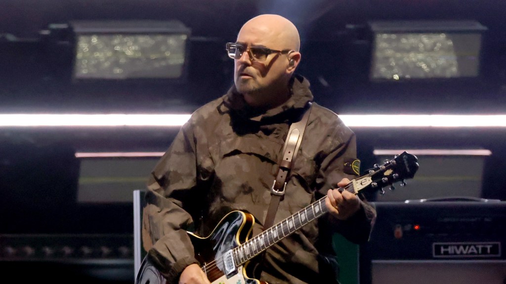 Oasis Guitarist Paul Arthurs Taking Break From Reunion Tour Amid Prostate Cancer Treatment
