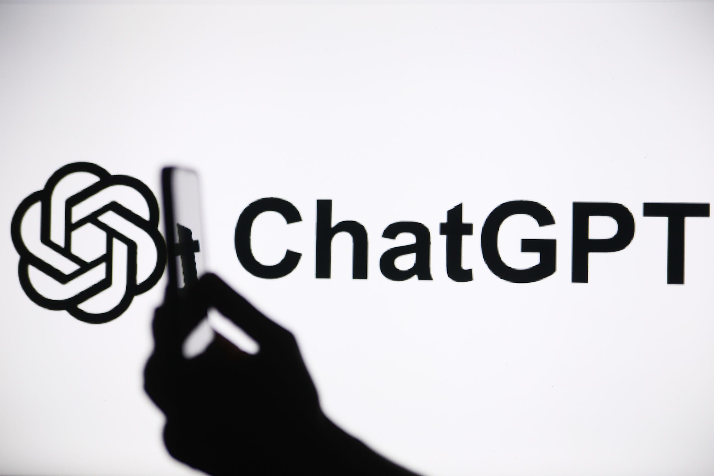 A photo illustration of ChatGPT's logo