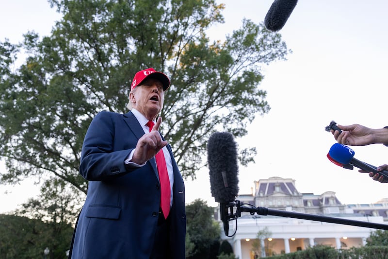 President Donald Trump talks to the media after walking off Marine One on the South Lawn of the White House on October 5, 2025 in Washington, D.C.