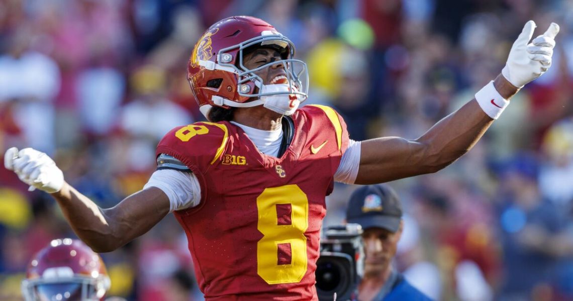 Plaschke: USC proves it’s a playoff contender in Coliseum-reviving beat down of Michigan