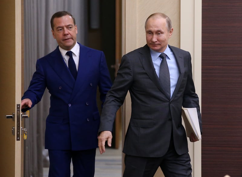 MOSCOW OBLAST, RUSSIA - APRIL 18: (RUSSIA OUT) Russian President Vladimir Putin (R) and Prime Minister Dmitry Medvedev (L) enter the hall during their weekly meeting with ministers of Russian Governmnet at Novo-Ogaryovo State residence on April,18, 2018 outside of Moscow, Russia. Russian President and Austrian Chancellor Sebastian Kurz spoke by phone on Wednesday to discuss the situation in Syria, according to the Kremlin Press Service. (Photo by Mikhail Svetlov/Getty Images)