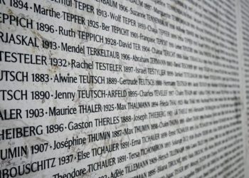 Putin haunts Paris courtroom in red hands trial