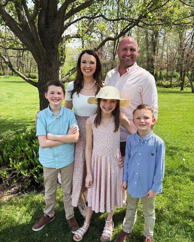 Darren Bailey and his grandchildren Finn, Samuel, and Vada Rose inside a Dunkin' Donuts.