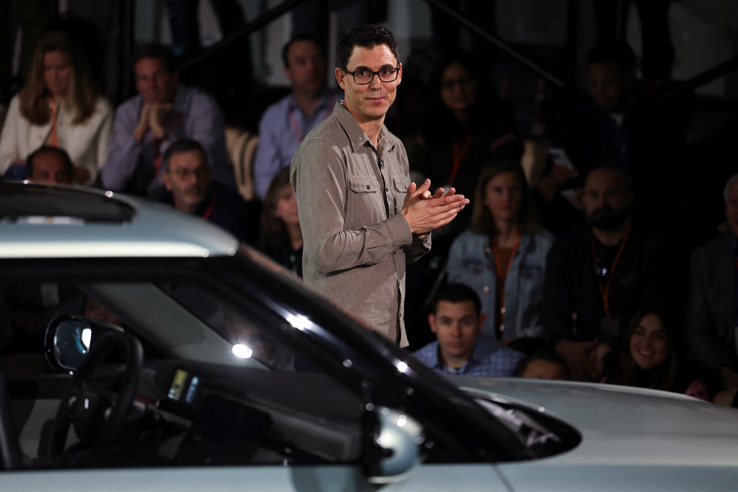 RJ Scaringe looks on during an event to unveil Rivian's R2