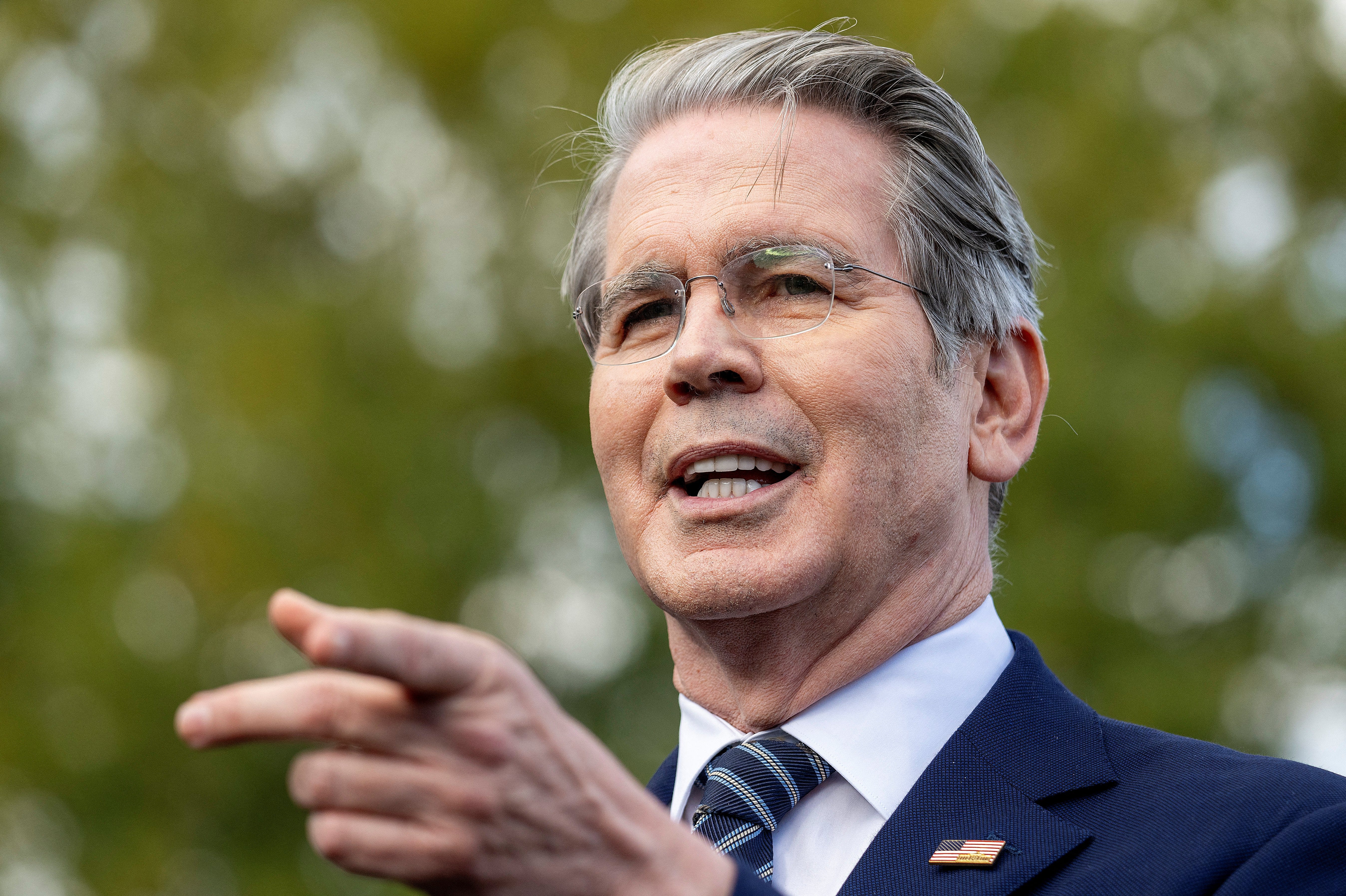 US Treasury Secretary Scott Bessent speaks with reporters outside the West Wing of the White House in Washington, DC, on October 22, 2025.