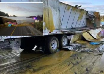 Semi-truck overturns and spills 46K pounds of apple sauce on Illinois interstate