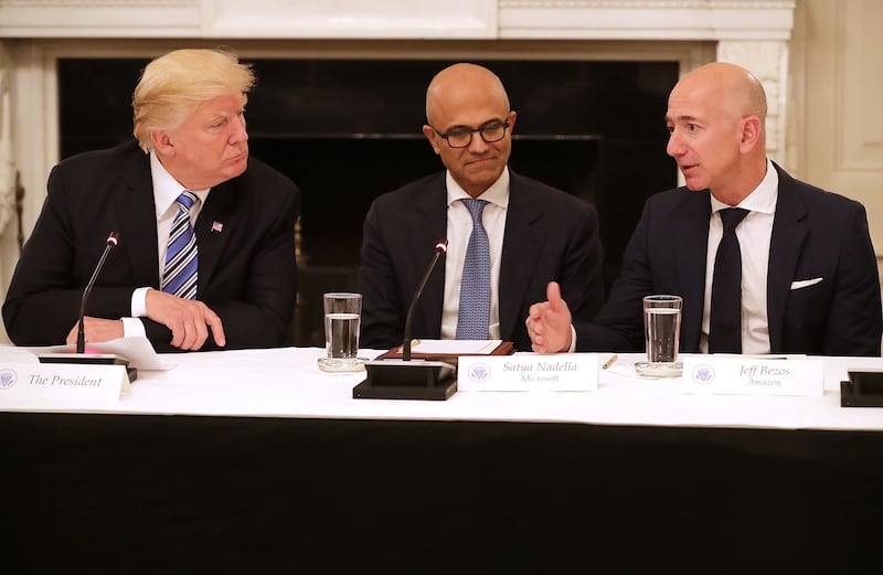 U.S. President Donald Trump, Microsoft CEO Stya Nadella and Amazon CEO Jeff Bezos