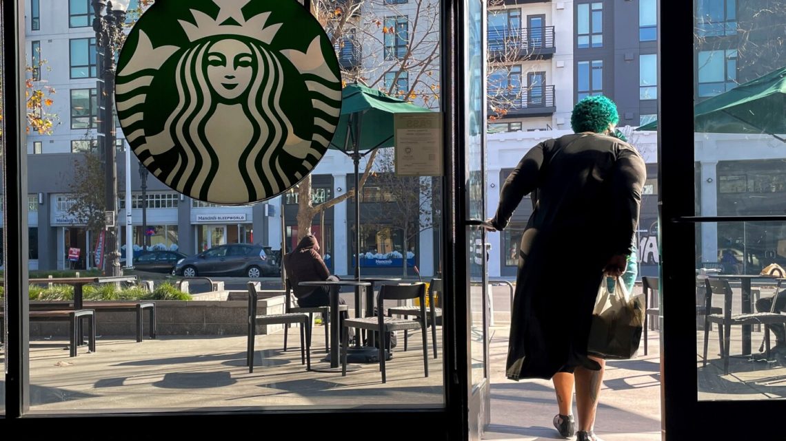Starbucks sales improve but store closures and layoffs take a bite out of profits