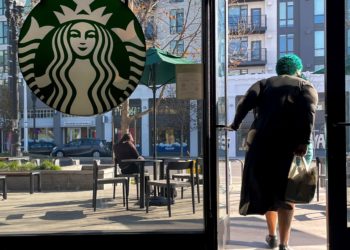 Starbucks sales improve but store closures and layoffs take a bite out of profits