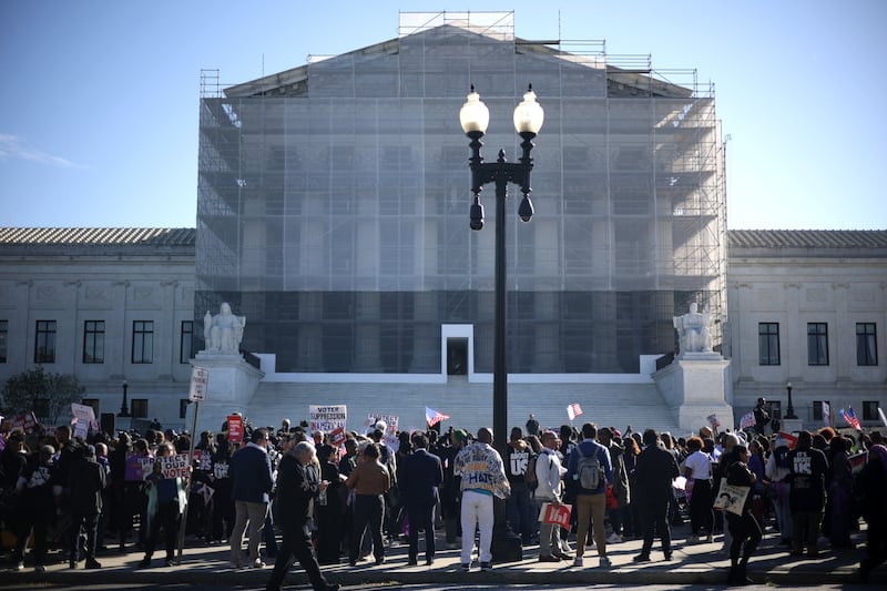 Activists gathered outside the Supreme Court on October 15, 2025 ahead of oral arguments in the major case over congressional maps, Louisiana v. Callais.