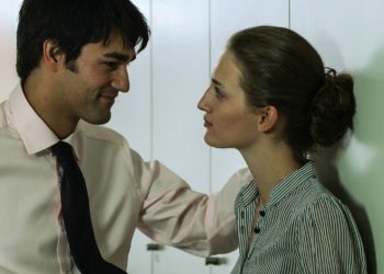 The Do’s and Don’ts of Flirting at Work Without Getting Fired, According to an Expert