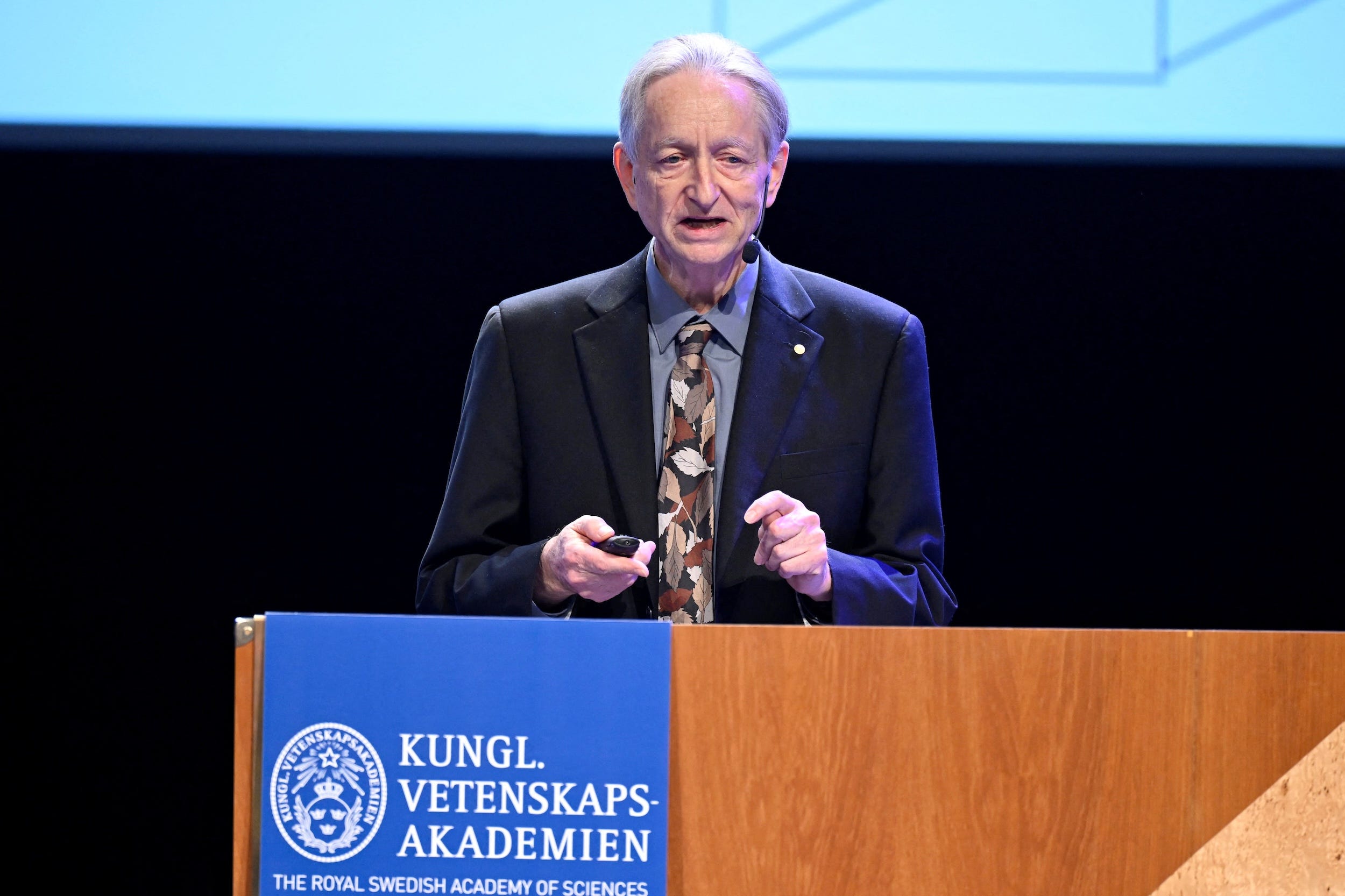 Geoffrey Hinton speaks during a Nobel Prize lecture
