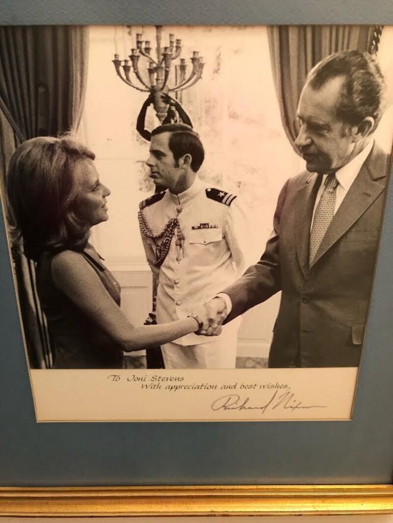 Joni Stevens shakes hands with Richard Nixon