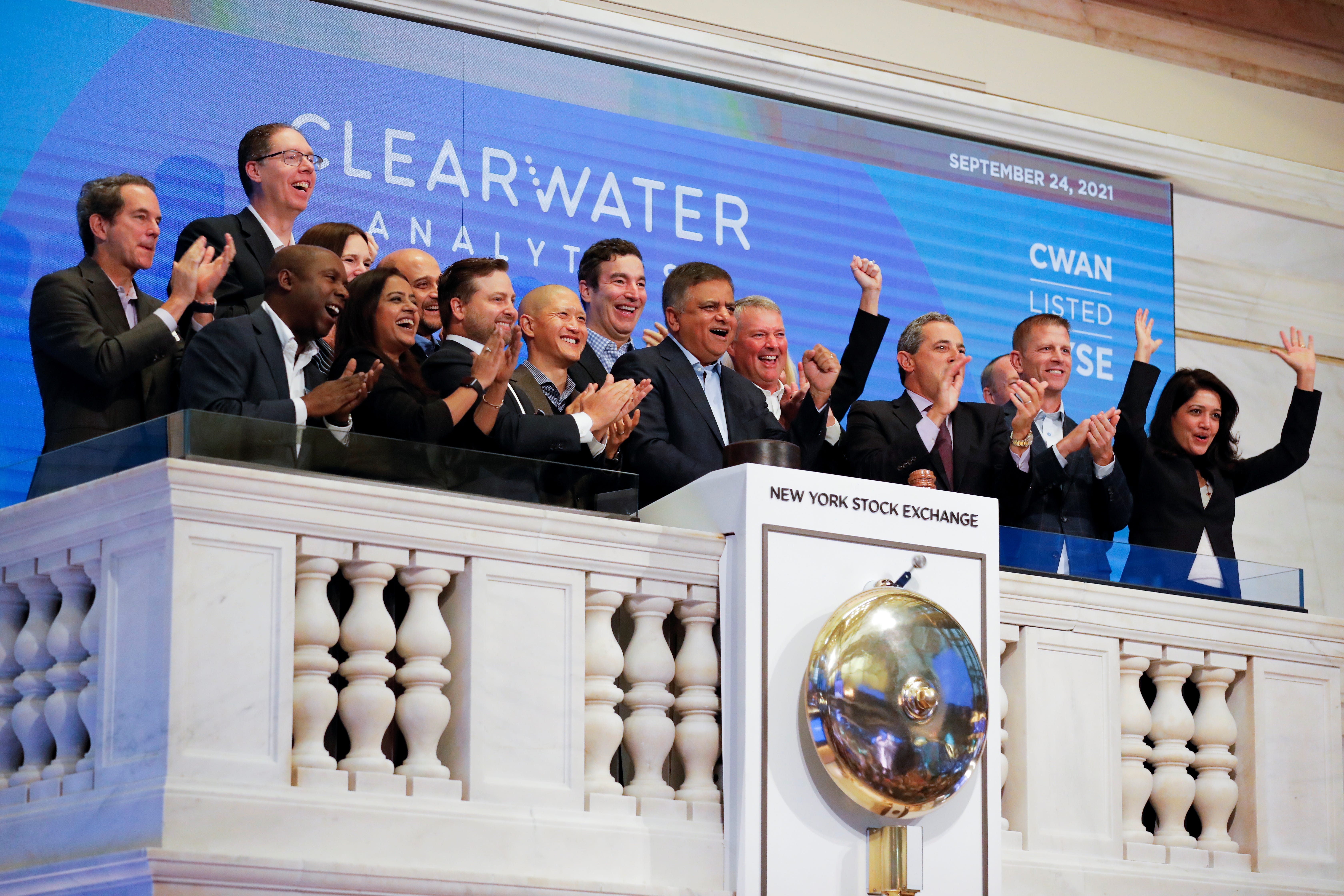 Clearwater Analytics CEO Sandeep Sahai rings the opening bell at the New York Stock Exchange.