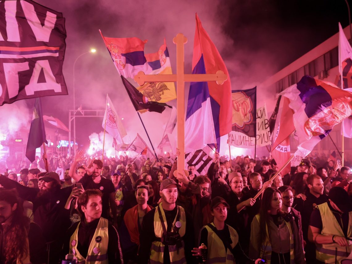 Thousands march in Serbia to mark deadly train station collapse a year ago
