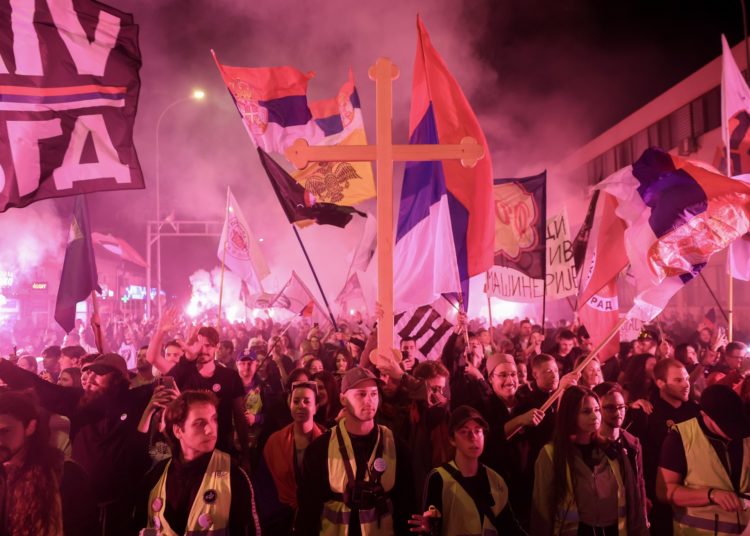 Thousands march in Serbia to mark deadly train station collapse a year ago