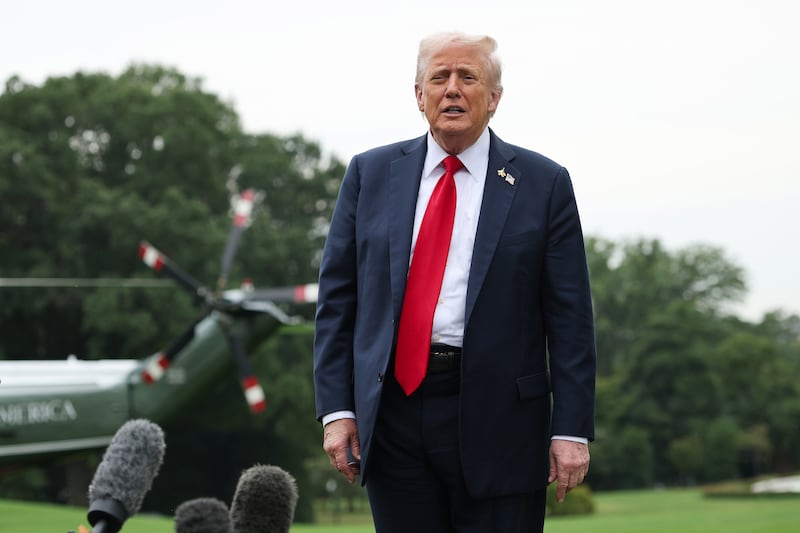 President Donald Trump speaks to the media as he returns to the White House on September 30, 2025 in Washington, DC.