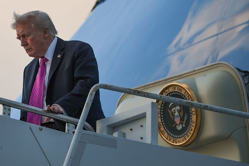 U. S. President Donald Trump walks down the steps of Air Force One after he landed at West Palm Beach International Airport on October 17, 2025 in West Palm Beach, Florida. President Trump is spending his weekend at Mar-a-Lago in Palm Beach, Florida.