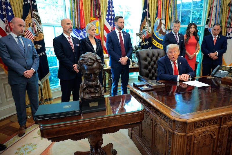 U.S. President Donald Trump speaks as he signs a series of executive Orders in the Oval Office
