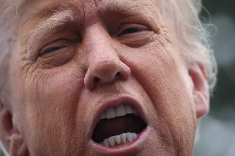 President Donald Trump speaks to the media as he departs the White House on September 30, 2025 in Washington, DC.